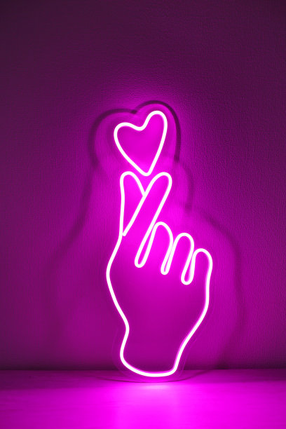 粉色霓虹灯标志的爱和喜欢。时尚的风格。图片下载