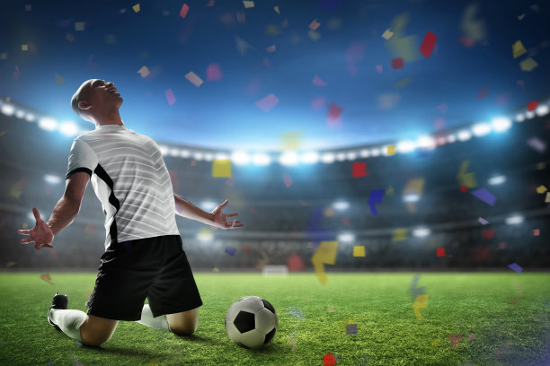 足球运动员在体育场庆祝图片下载