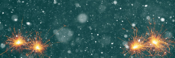 在抽象的雪景背景上燃烧的火花，带有广告空间的派对概念图片下载