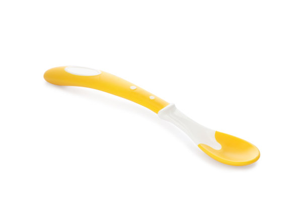 塑料勺子隔离在白色。婴儿食品服务图片下载