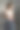 一位女士站在办公室里喝奶昔，用手机图片下载