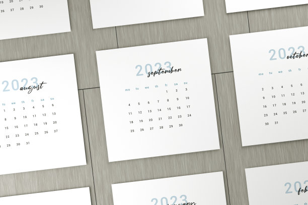 2023九月日历页在木桌子上图片下载