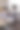 一家三口坐在客厅沙发上使用平板电脑。- - -库存图片图片下载