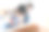 亚洲男孩在家里作坊用钻头和父亲学习木工技能图片下载