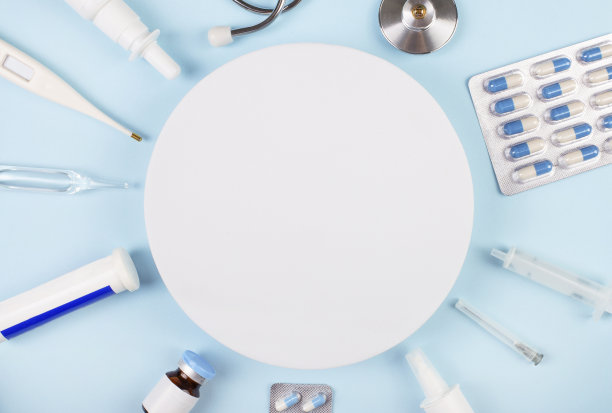 浅蓝色医学背景。平铺，俯视图。医疗保健医学概念。模型图片下载