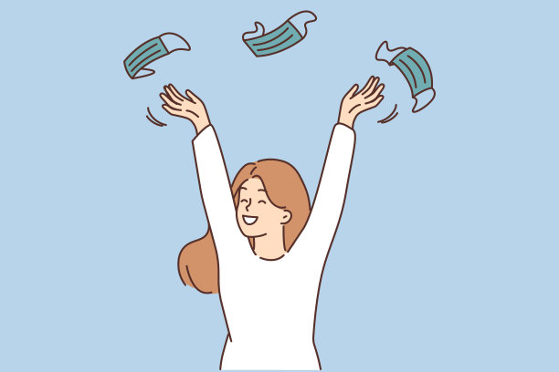 笑着扔口罩的妇女对大流行结束感到兴奋图片下载