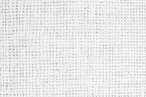 白色的布料质地覆盖床。棉纱和亚麻清洁图案背景。天然黄麻麻袋布帆布编织有机漂白彩色台布空白用于装饰。图片下载