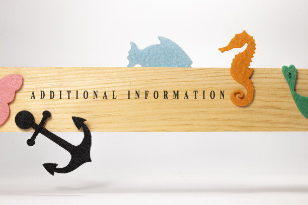 附加的信息写在木制图案的表面上。教育与儿童心理学图片下载