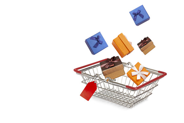 礼品盒飞进了白色背景的购物车图片下载