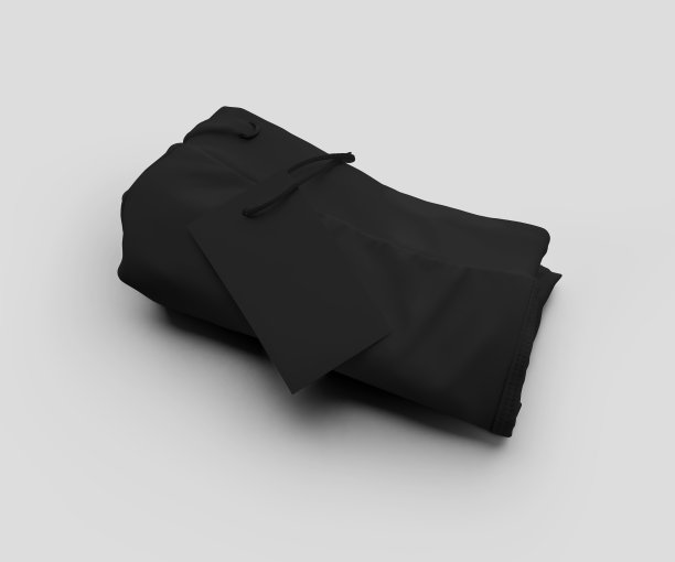 黑色男性泳裤模型，对角线展示，泳装与，夏天的主题，孤立的背景。图片下载