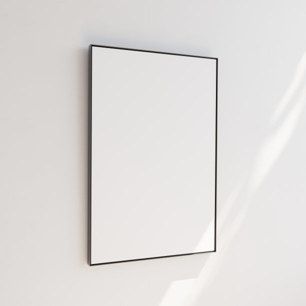 肖像定向空白图片在白色墙壁，薄黑色金属边框。内容的模板。3 d演示。图片下载