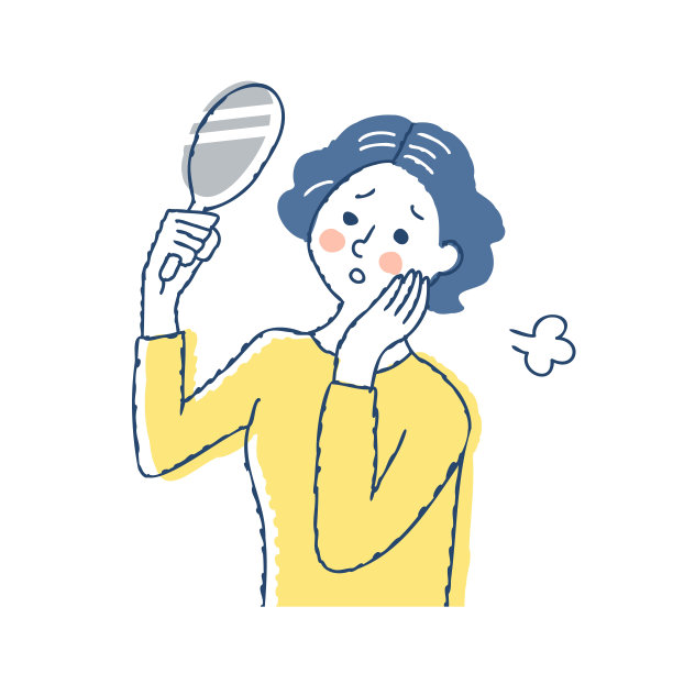 一个女人看着手镜中的白发图片下载