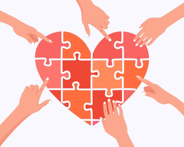 人们手里拿着大心拼图符号。慈善捐赠。把你的爱分享给别人。一群参加社会公益活动的志愿者图片下载