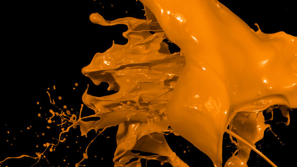 橙色液体飞溅，漩涡和波与分散的水滴图片下载