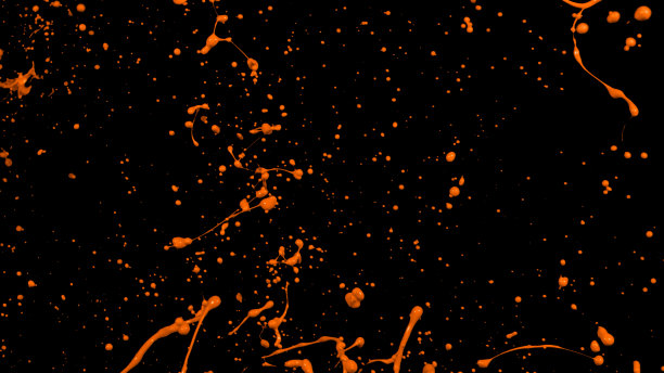 橙色液体飞溅，漩涡和波与分散的水滴图片下载