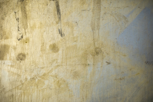 肮脏的表面。挠塑料。墙上有泥土的痕迹。图片下载