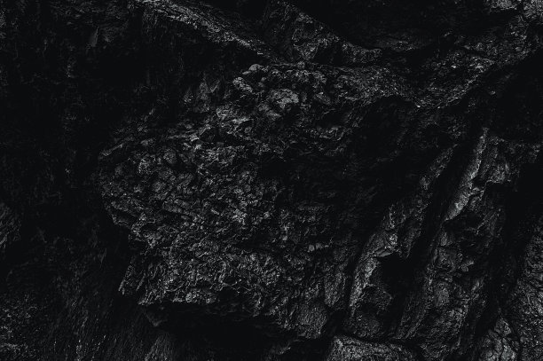 棕色的纹理。石头的背景。岩石纹理。枯燥乏味的粗糙结构。抽象的纹理。岩石表面有裂缝。岩石堆。墙漆点。大理石墙壁。图片下载