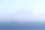 有大型船舶和山脉的沿海海景图片下载
