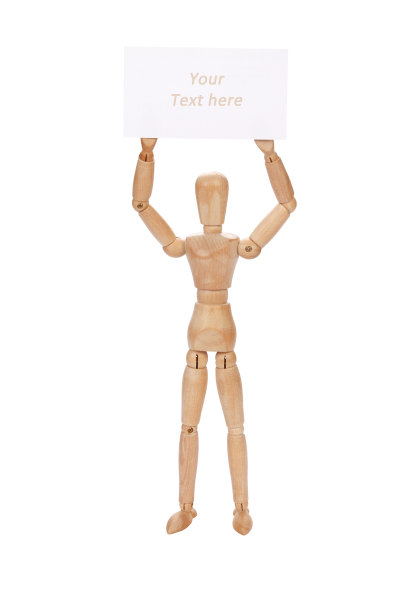 一个孤立在白色背景上的木制人物的特写镜头图片下载