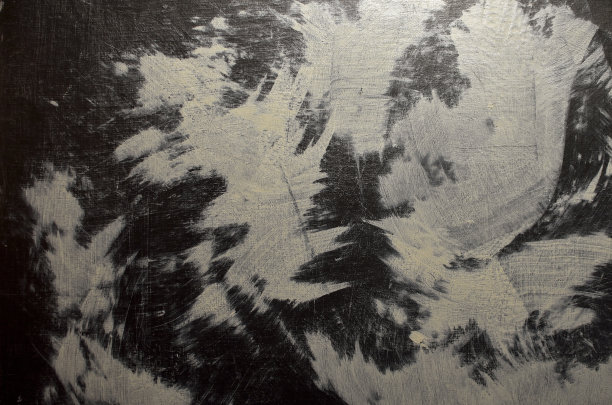 灰暗的黑色背景与灰色和白色的飞溅图片下载