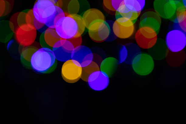 圣诞灯。丰富多彩的抽象背景。散景背景。图片下载