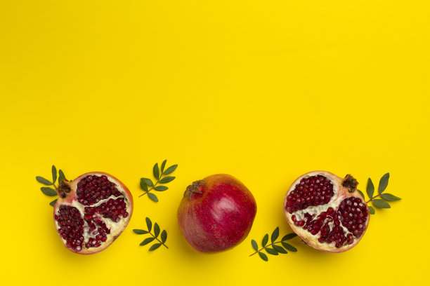 鲜嫩多汁的石榴颜色背景，俯视图图片下载