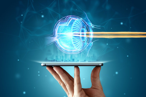 激光眼科手术，人眼全息影像和激光束。眼科手术的概念，导管，整骨，现代眼科医生。图片下载