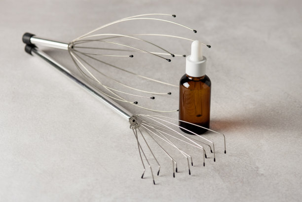 头颈按摩器和精油家庭使用穴位头头皮章鱼按摩器放松按摩器工具头痛疼痛和缓解压力放松图片下载