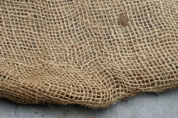 黄麻麻布袋。粗麻布纹理。图片下载