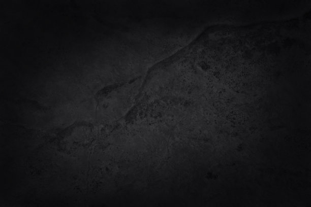 深灰色黑色石板纹理具有高分辨率，背景为天然黑色石墙。图片下载