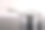 不锈钢勺子坐在现代炉玻璃陶瓷滚刀。图片下载