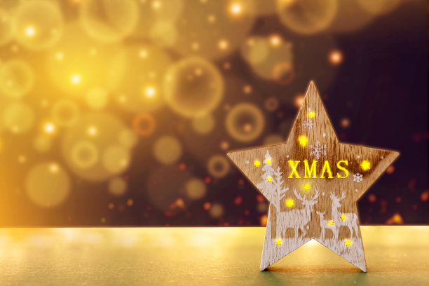 圣诞木生态星圣诞背景上的黄金散景。圣诞背景，生态节日风格图片下载