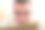 戴眼镜的男人专注地拿着书，看着相机图片下载