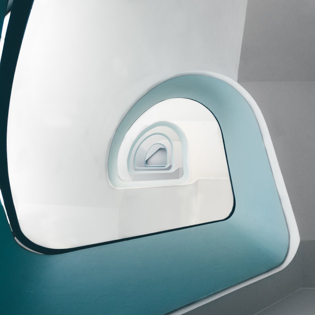 灯光下的现代螺旋楼梯的高角度视图图片下载