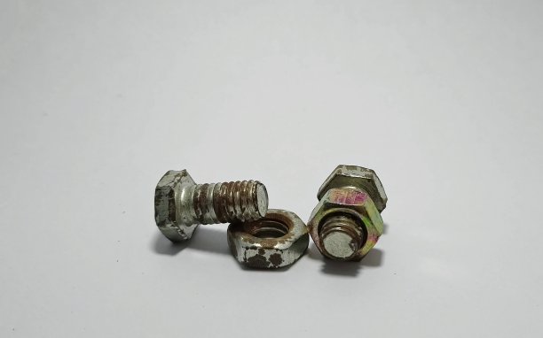 图片背景的螺母和螺栓图片下载
