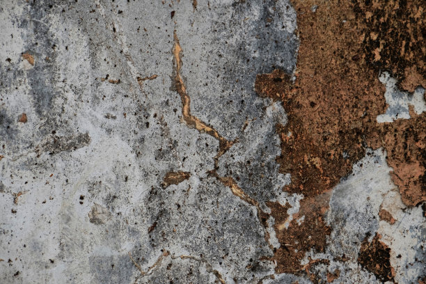 旧墙的纹理背景充满污渍和划痕，垃圾的纹理背景图片下载