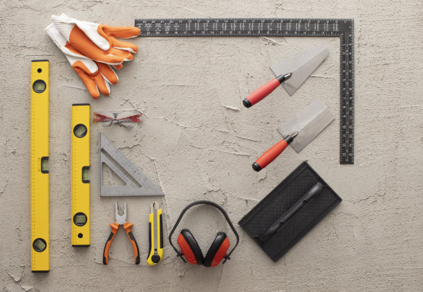 施工工具在混凝土背景上复制空间库存照片图片下载