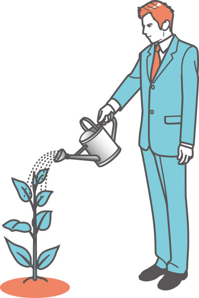 给正在生长的植物浇水的人。图片下载