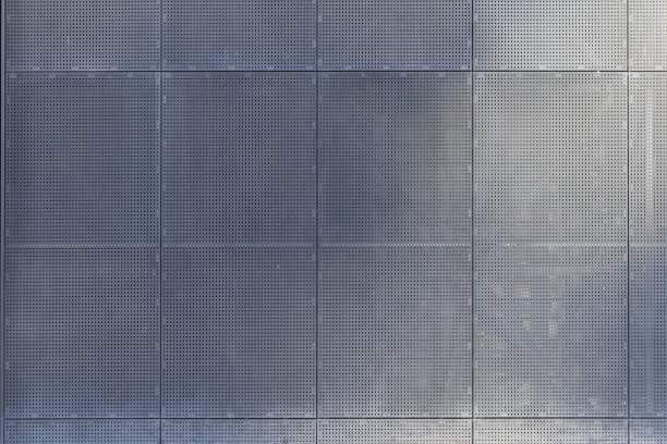 黑色方形钢板背景带小孔图片下载