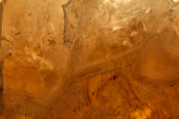 奢华的原黄色玛瑙水晶表面质地作为背景。自然图案表面，抽象设计元素的矿物石材宏观特写。图片下载
