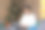 亚洲人在圣诞节坐在家里的沙发上用笔记本电脑工作，在客厅靠近圣诞树，他自己在酒店庆祝新年微笑和快乐，商人在出差图片下载