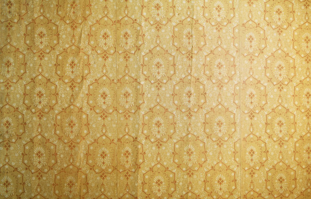 墙上的旧墙纸。旧墙纸的纹理或背景。图片下载