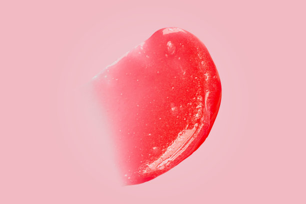 美容面膜色块涂抹上粉红色的斑点隔离。红脸乳液牙刷保湿质地。护肤产品，儿童牙刷，脱毛蜡剪样图片下载