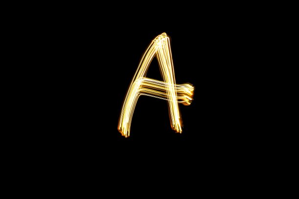 光画字母A在黑色背景图片下载