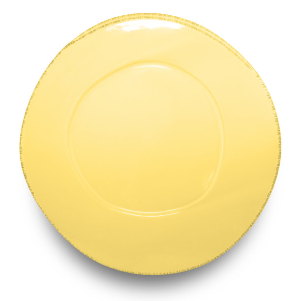 白色背景上的黄色圆形陶瓷板。图片下载