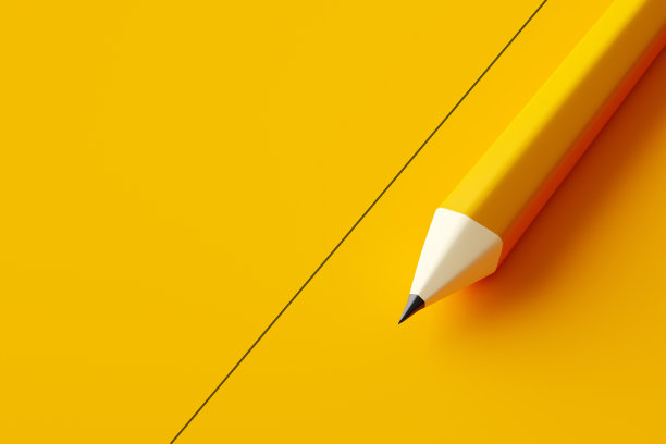 用铅笔在黄色背景上画一条直线。图片下载