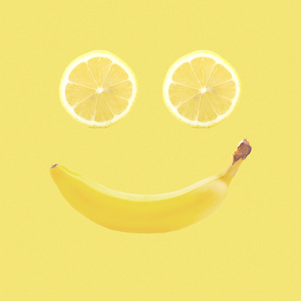 当代艺术拼贴。微笑的香蕉和柠檬。图片下载