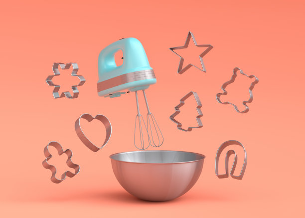 金属碗与电动搅拌机和饼干切割器在珊瑚的背景图片下载
