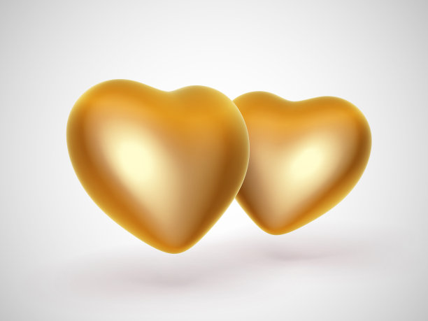 白色背景上的两个3D金心。人类关系或婚礼仪式的概念:情侣的心是金子做的。图片下载