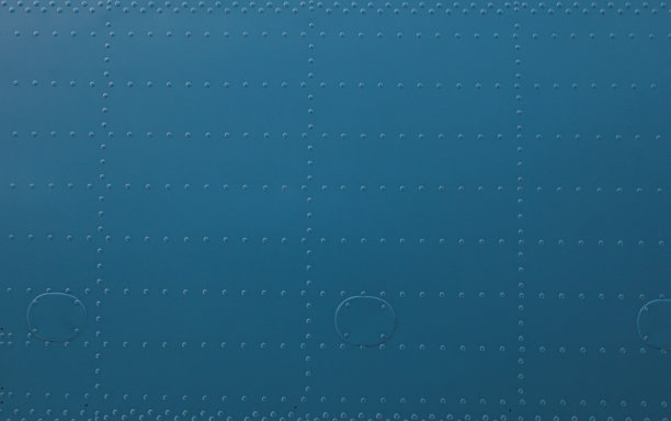 来自飞机金属外壳的抽象背景。图片下载